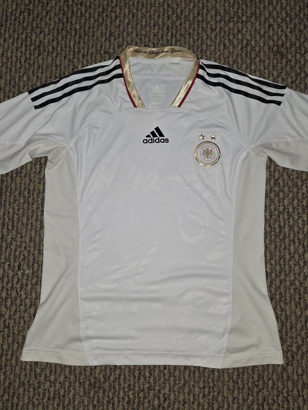 adidas White Soccer Jersey with Black Stripes and Gold Accents